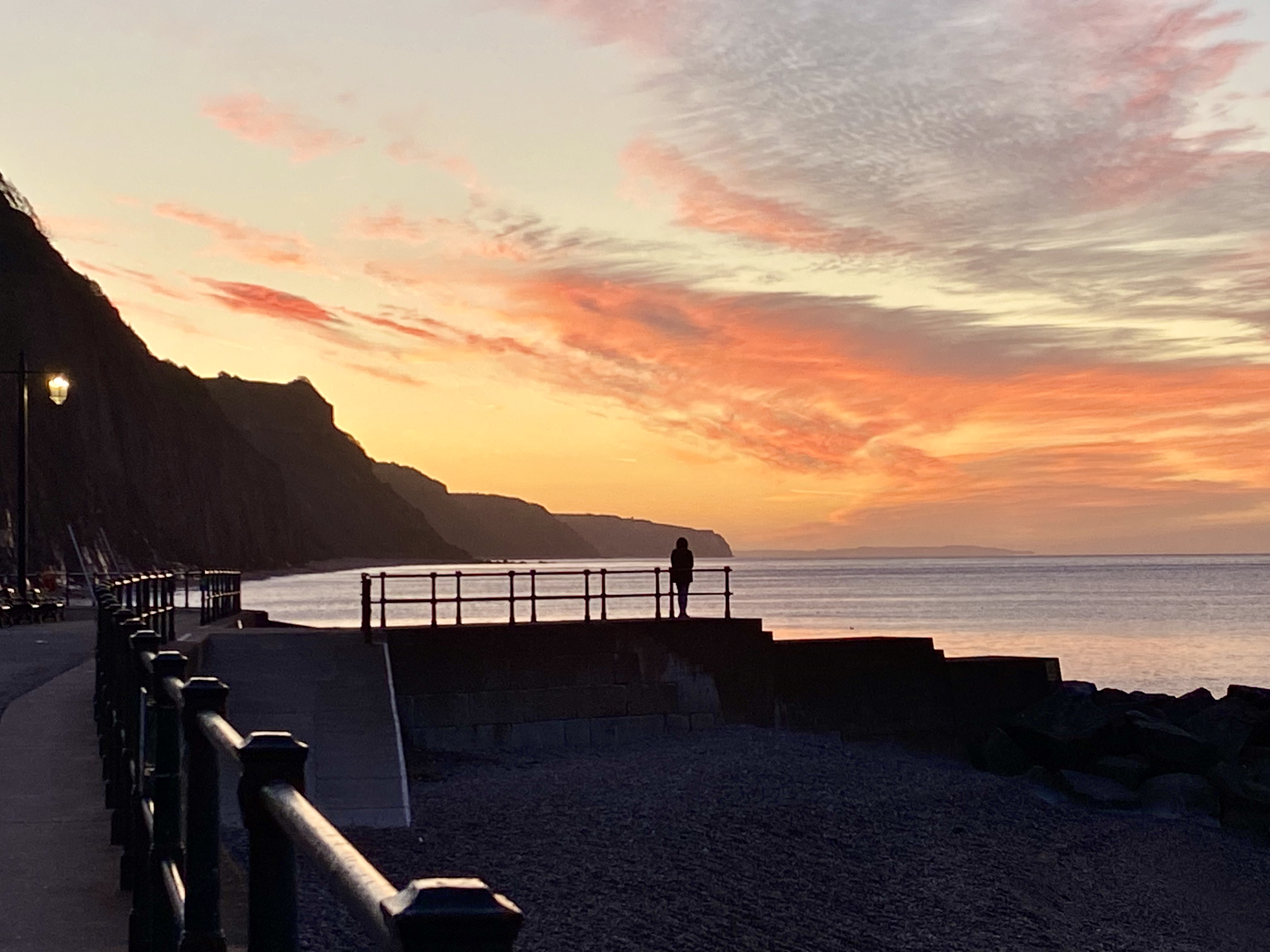 Photo of a coastal sunrise
