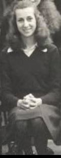 black and white photo of a girl with brown hair in school uniform