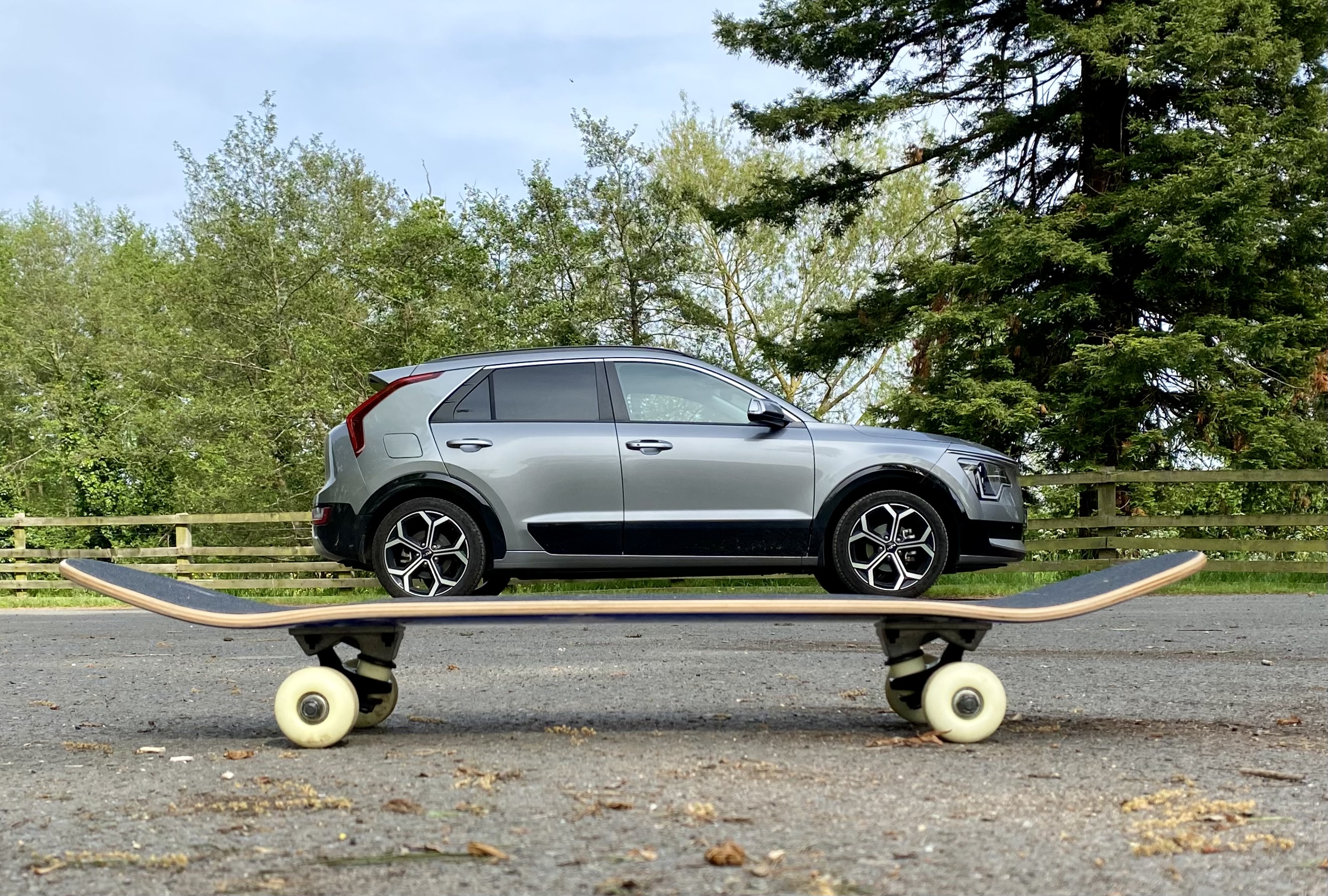 photo which looks like a grey car is riding a skateboard!